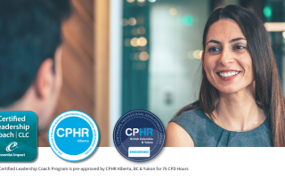 Two professionals having a coaching conversation during CPD & CLC Training - Essential Impact & CPHR Alberta | BC & Yukon